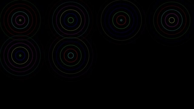 Futuristic glowing neon circular patterns rotating on a black background