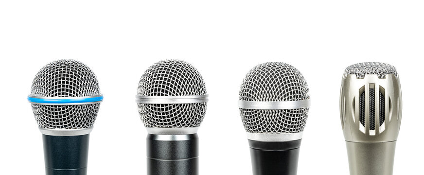 Close up, set of four microphone heads isolated on white background.