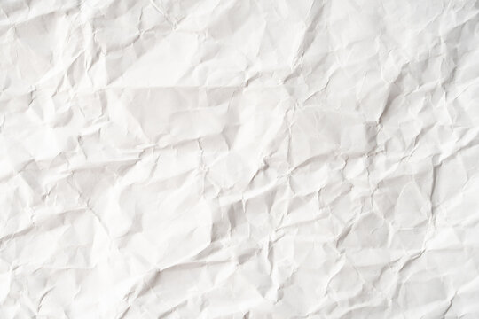 Grunge wrinkled white color paper textured background with copy space. Use for decoration or layer
