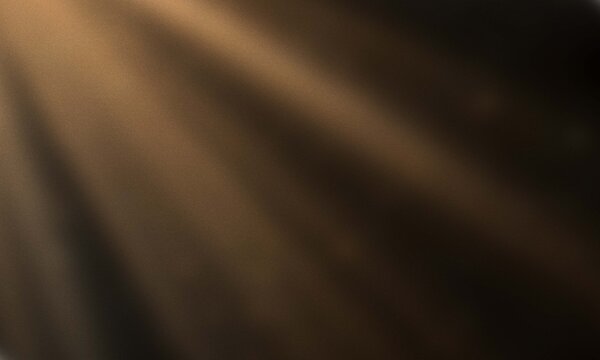 Abstract background with soft golden light rays streaming through dark shadows creating a mysterious and elegant atmosphere