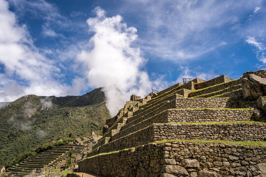 Panoramic view of Machu Picchu ruins with Huayna Picchu in background, Peru