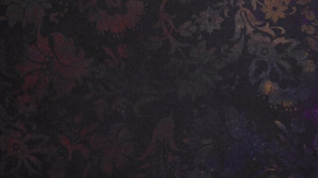 Close Up Shot of Dark Vintage Floral Damask Pattern with Warm Gold Accents
