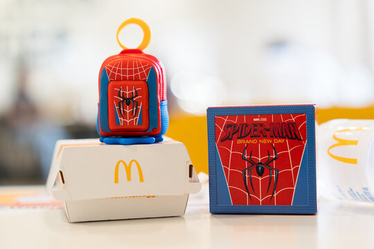 Bangkok, Thailand - July 27, 2026 : Mini Red and Blue Spider-Man Backpack form  Mcdonald Happy Meal set. The current promotion features 10 to 12 unique collectible