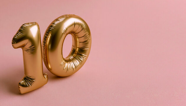 Golden number 10 foil balloons on soft pink background with copy space, perfect for tenth birthday celebrations, anniversary promotions, milestone events, party invitations, social media