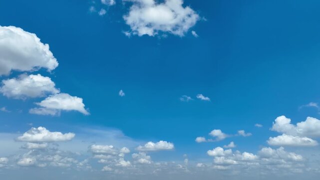 Panoramic drone perspective across an expansive blue sky, illustrating clean air concepts, renewable power opportunities, carbon neutral ambitions, and the limitless beauty of nature&rsquo;s future. 4k.
