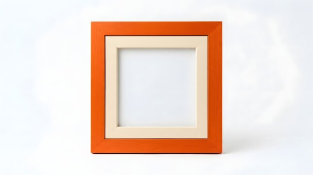 Wooden picture frame with orange border and cream mount isolated on plain background