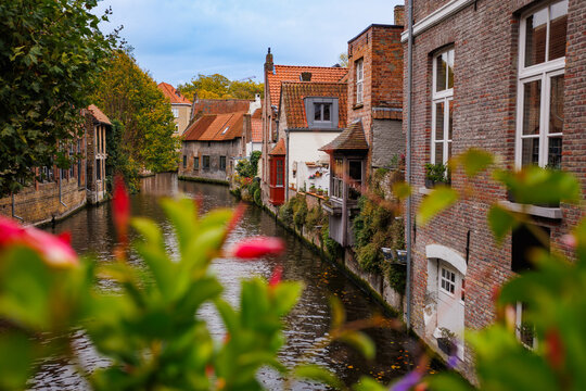Brick houses along a small canal in famous town Bruges, Belgium