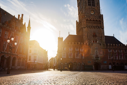 Historic square with brick townhall at sunset, Bruges, Belgium