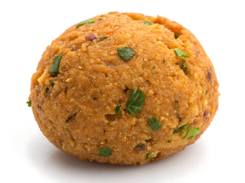 A single Dal Vada, crunchy lentil fritter, irregular round shape, realistic food photography, isolated