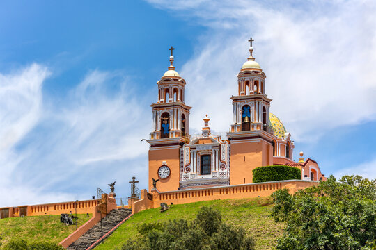 Our Lady of Remedies Church crowns Tlachihualtepetl, the Great Pyramid of Cholula, blending colonial architecture with ancient history in Cholula, Puebla, Mexico