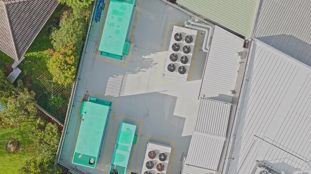 Aerial view of industrial building rooftop hvac units