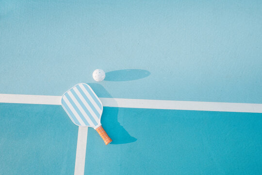 Pickleball Paddle and Ball with Copy Space
