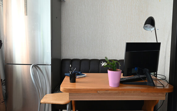 Small office with desk and couch setup