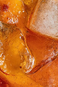 Old Fashioned Multiple Ice Cubes Amber Bourbon Bitters Abstract Macro Dark Background Vertical