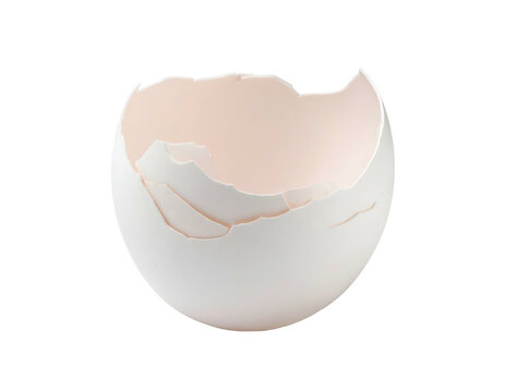Empty broken white eggshell isolated on a solid black background