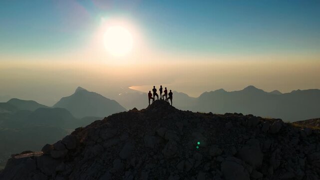Peak Standing Woman Sunrise Reveal
