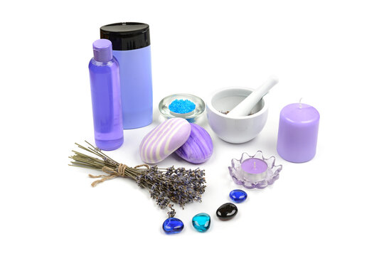 Spa Still Life with Lavender, Purple Candles, Soap, Bottles, and Mortar Isolated on White Background