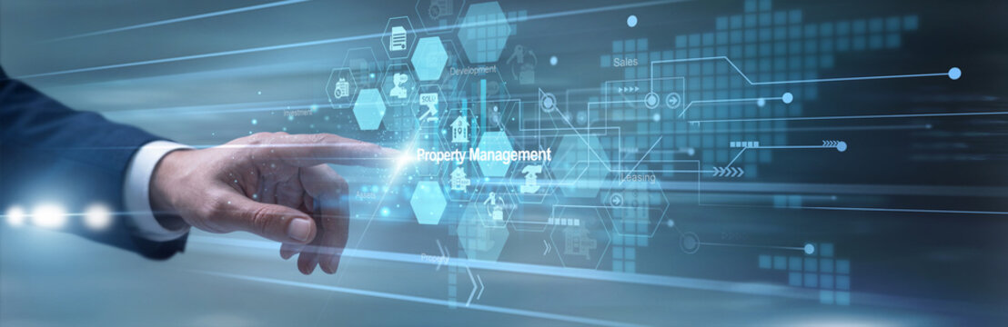 Real estate agent confidently touching interactive screen updating Property Management files across the central network database. Consultant reviewing lease agreements and housing profiles.