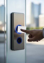 Naklejka premium Person Using a White Smart Card to Access a Modern Electronic Security Door Lock with Blue LED Lights in an Office