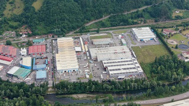 Aerial view of heavy industry zone and water purification infrastructure in Asturias, Spain