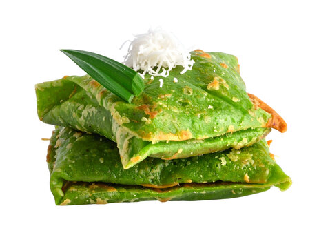 Stack of Kui Dadar Green Indonesian Pandan Crepes with Grated Coconut Topping