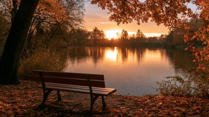 Fototapeta premium Serene Wooden Bench by Peaceful Lake Surrounded by Trees at Sunset with Colorful Autumn Foliage Reflected in Water