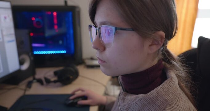 Girl with Glasses Drawing Picture on Desktop Computer Monitor. 4K 10-bit
