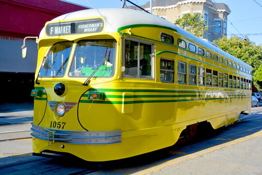 Historic street car transporting passengers in San Fransisco CA USA. San Francisco street cars come from all around the wolrd.