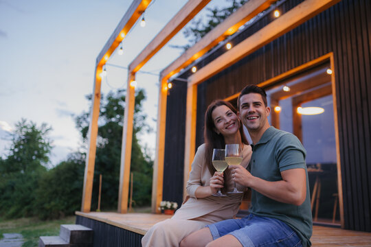 Romantic date for young couple in small cottage in nature.