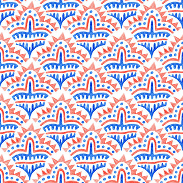 Seamless folk geometric pattern. Hand drawn with colored pencils. Ethnic ornaments in red and blue. Perfect for fabric and decor.