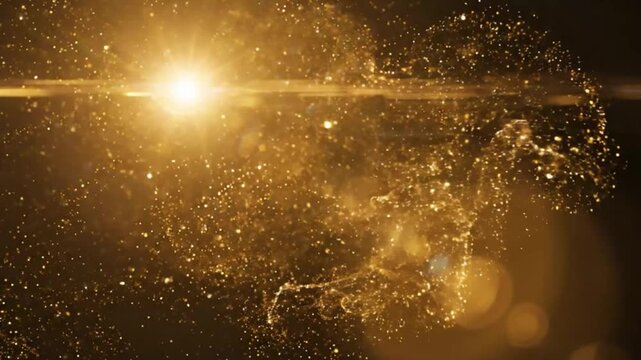 Bright golden light flare with sparkles on black background