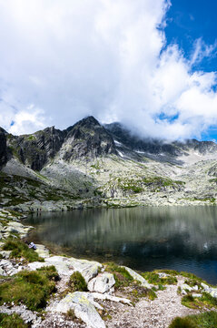 Mountain lake in the Valley of Five Spis Lakes in the High Tatras, Slovakia