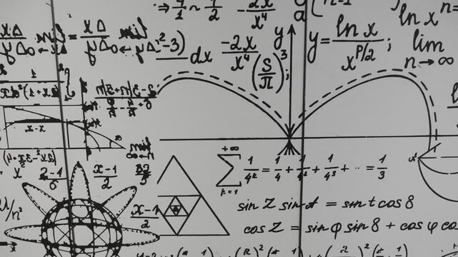 mathematical formulas, equations and geometric diagrams on chalkboard	