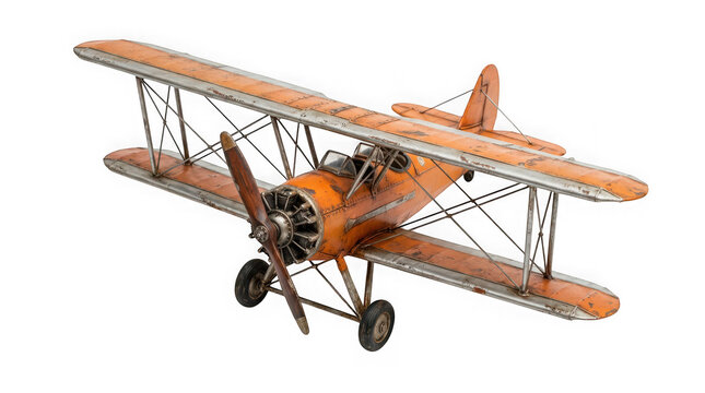 Vintage orange biplane model with weathered metal texture isolated on transparent background