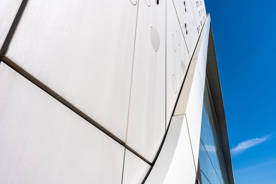 Modern White Building Facade Detail With Geometric Panels And Contemporary Architectural Design