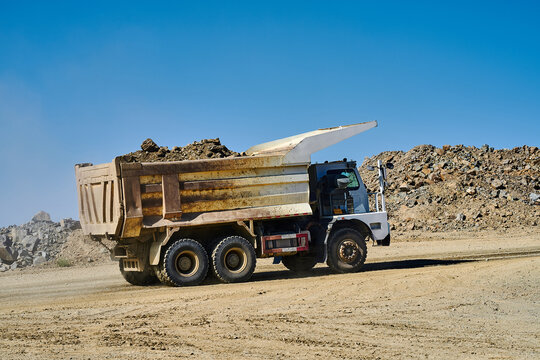 Dump truck in open-pit copper mining site