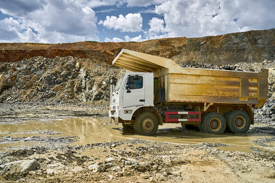 Heavy-duty dump truck in open-pit copper mine
