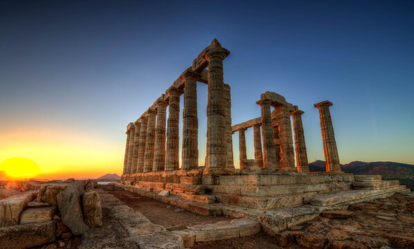 Sunset temple of Poseidon, Cape Sunio, Attica, Greece, Europe 