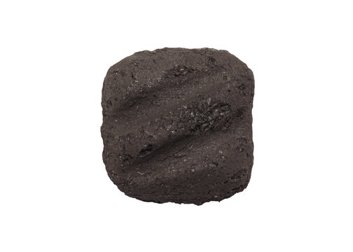 Single charcoal briquette isolated on white for grilling and barbecue concepts.