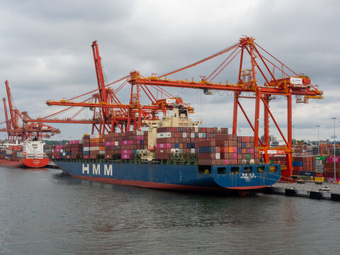 Vancouver BC, Canada - May 30, 2022: Hyundai Tokyo container ship docked at Centerm container terminal in downtown Vancouver