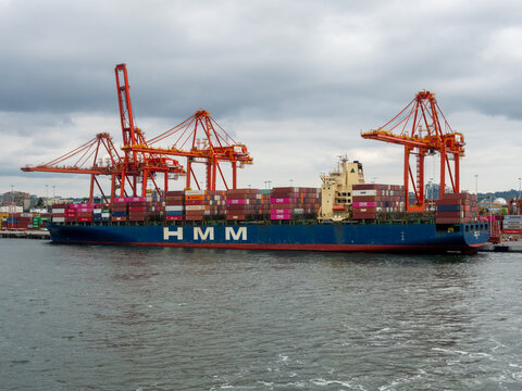 Vancouver BC, Canada - May 30, 2022: Hyundai Tokyo container ship docked at Centerm container terminal in downtown Vancouver