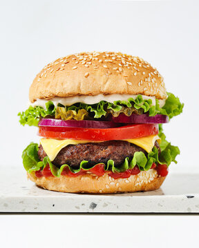 Gourmet burger with fresh ingredients and food styling
