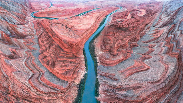 Aerial canyon river winding through sandstone, Utah, USA
