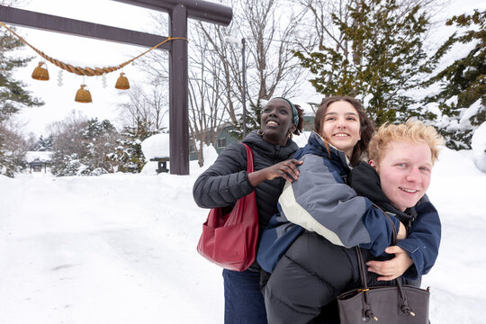 Friends exploring wintry japan together