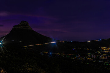Lion's Head at night with car light trails, Cape Town © Wikus