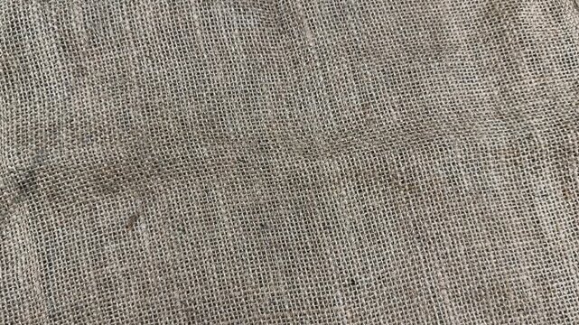 Closeup texture of rough brown burlap fabric