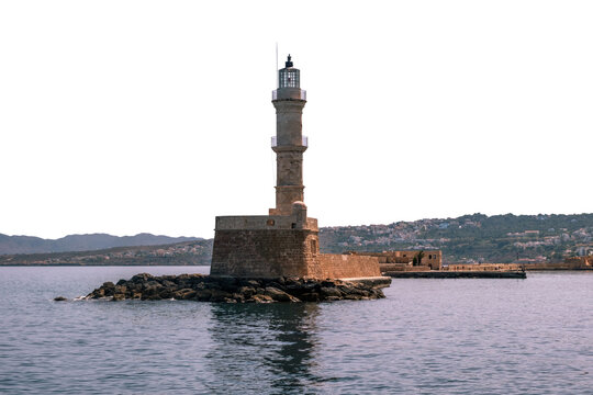 Crete Greece. Lighthouse, beacon at Venetian harbour in Old Town of Chania, isolated on white trsnsparent.