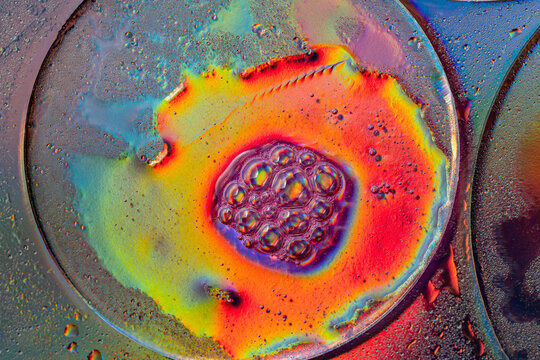 Vibrant neon bubbles with iridescent colors in close-up