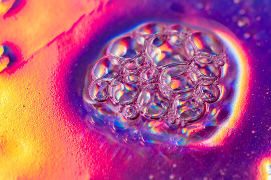 Vibrant neon bubbles with colorful reflections