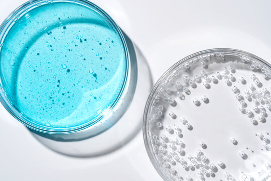 Top view of laboratory glassware with blue solution and bubbles